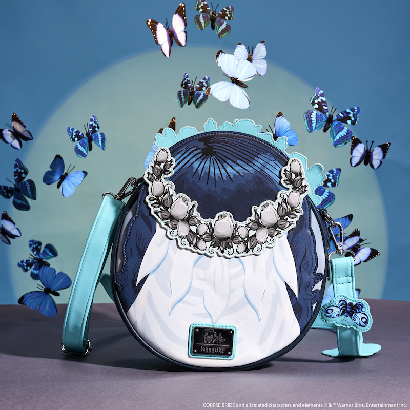 Image of the back of the circular crossbody featuring Emily from Tim Burton's The Corpse Bride, showing the back of her head with her veil against a blue background surrounded by butterflies